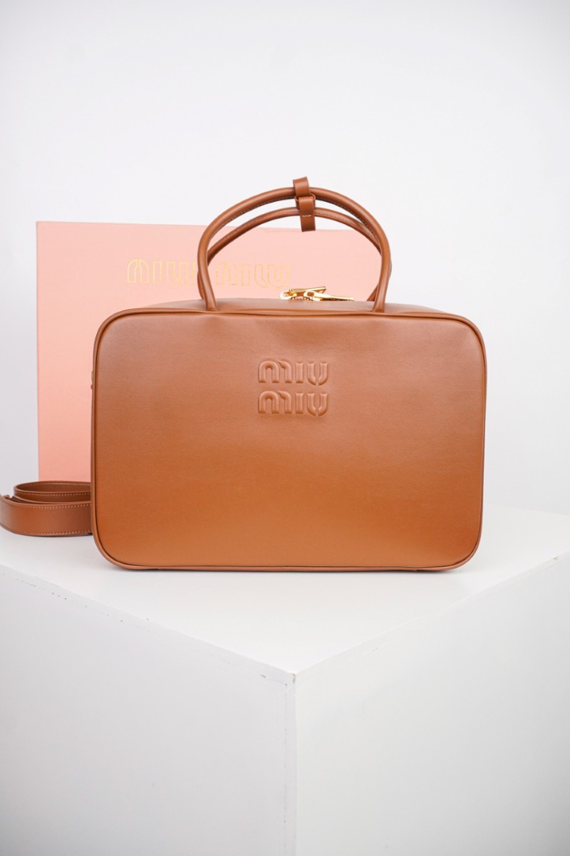 Miu Miu Logo Embossed Zip Tote Brown 10