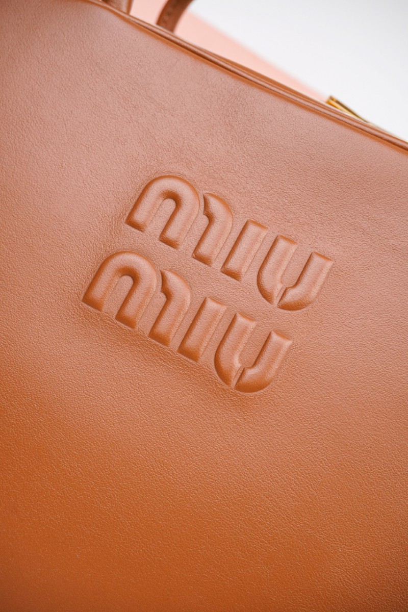 Miu Miu Logo Embossed Zip Tote Brown 12