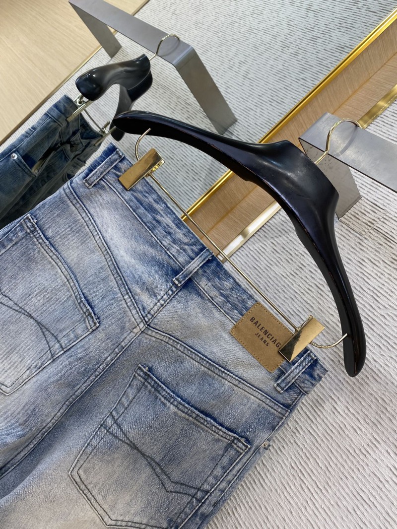 Balenciaga washed denim trousers 7