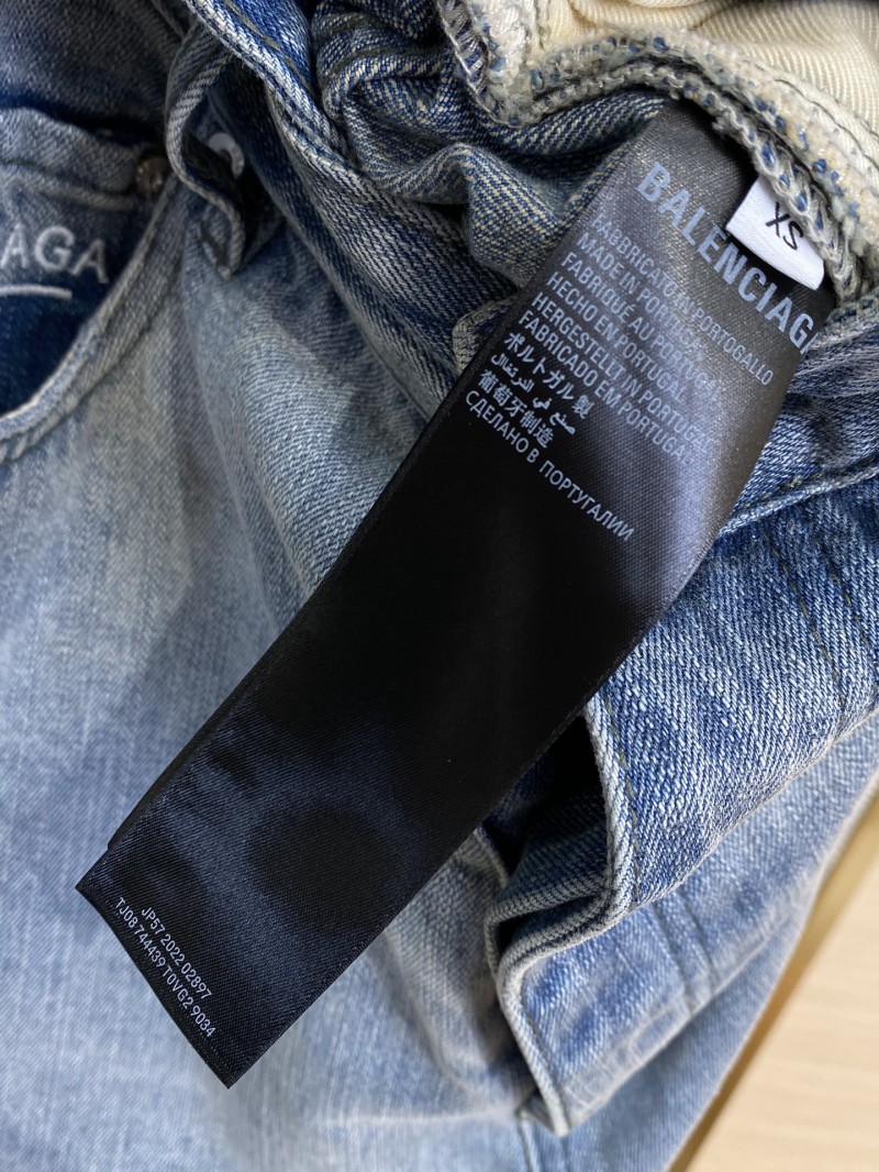 Balenciaga washed denim trousers 8
