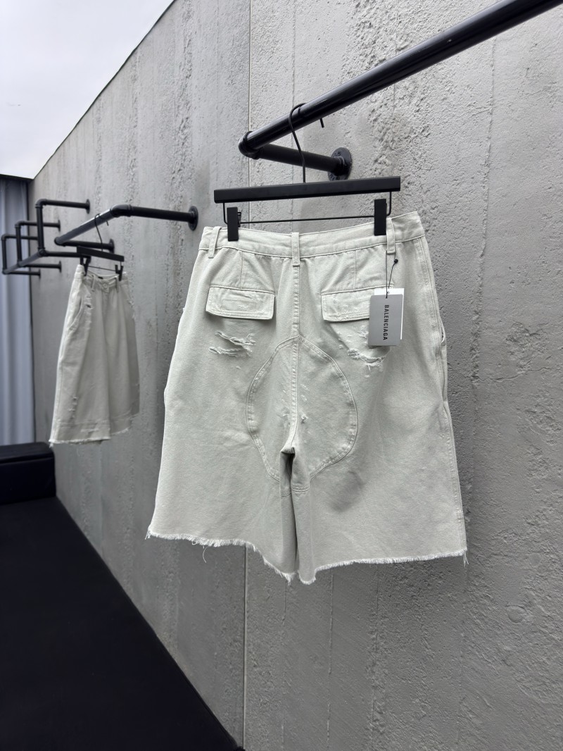 Balenciaga distressed and faded light gray shorts 1