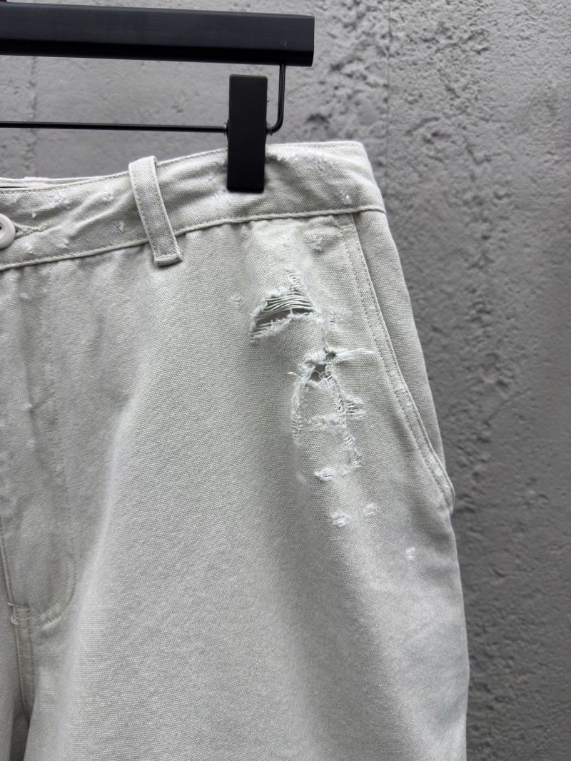 Balenciaga distressed and faded light gray shorts 4