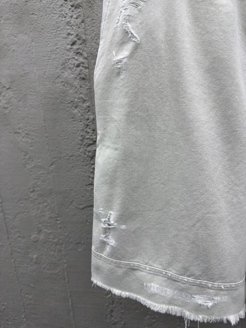 Balenciaga distressed and faded light gray shorts 5