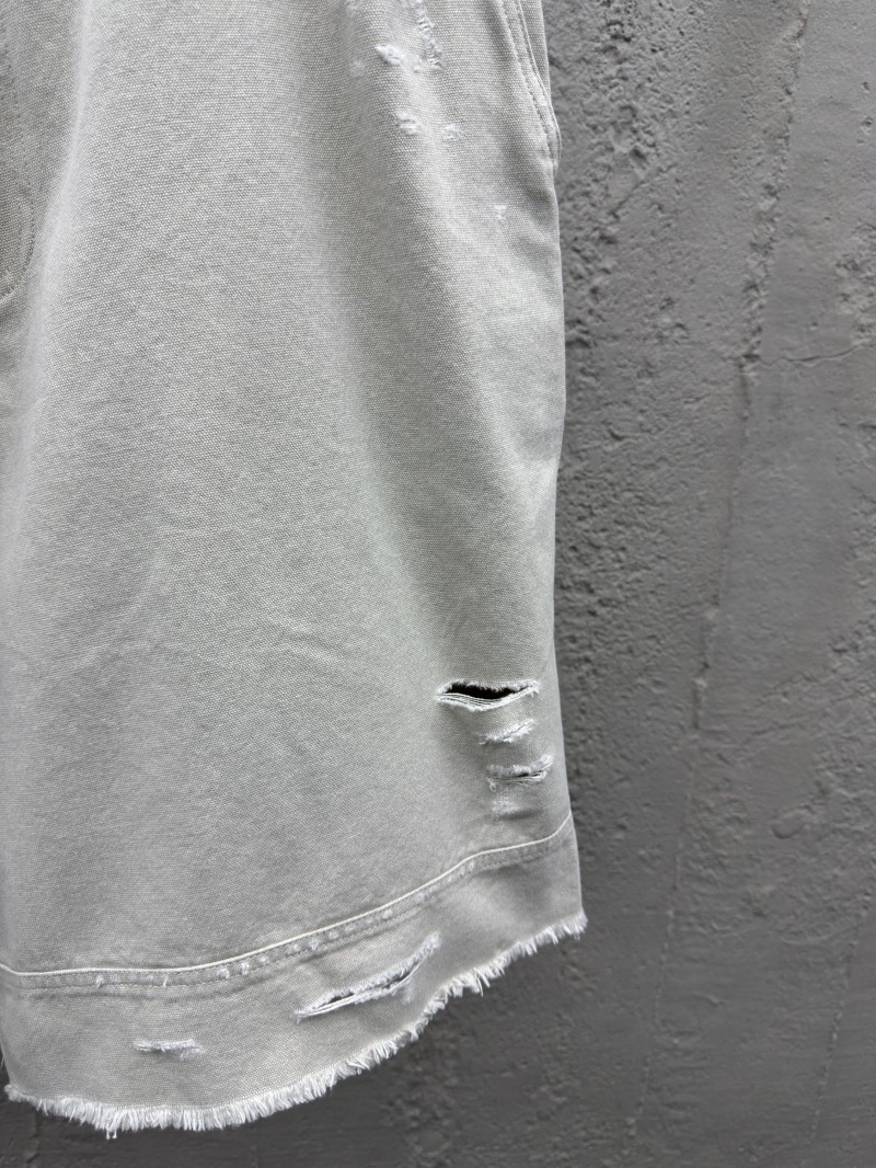 Balenciaga distressed and faded light gray shorts 6