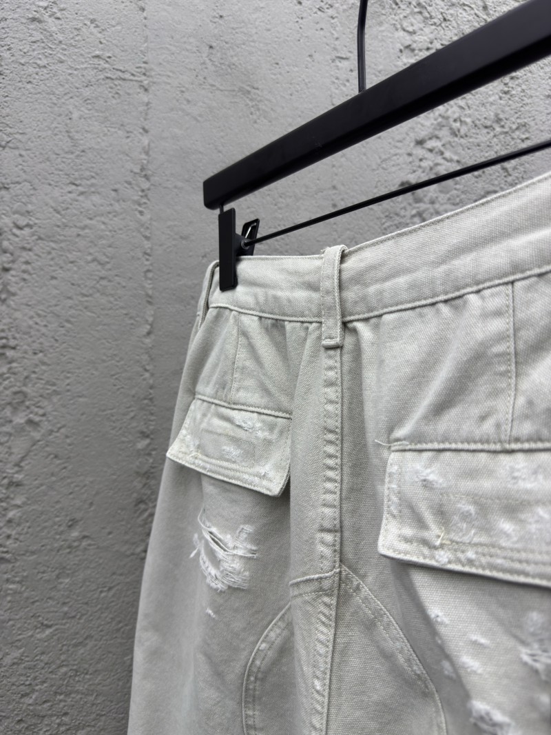 Balenciaga distressed and faded light gray shorts 8