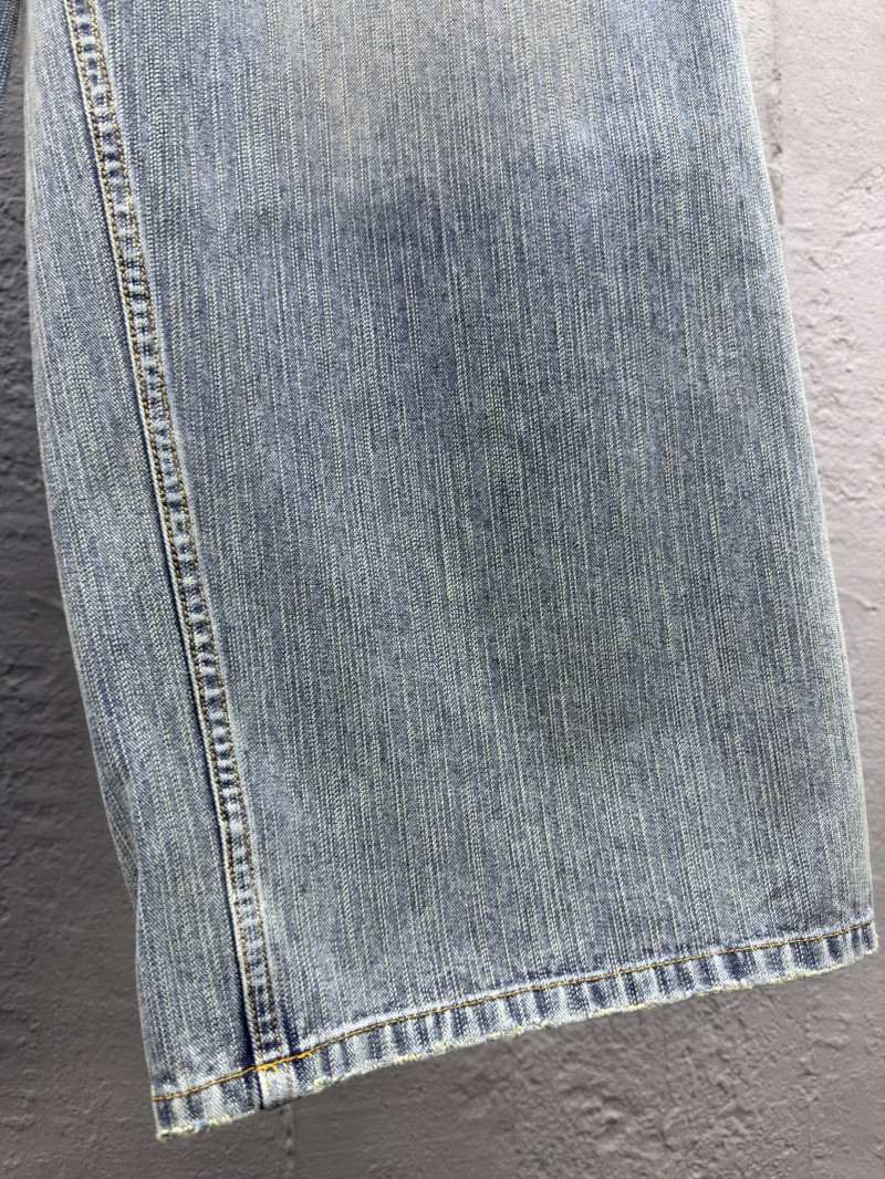 Balenciaga embroidered denim pants with red lettering 6