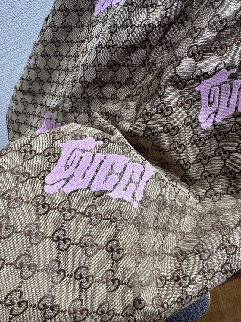 Gucci All-Over Letter Embroidered Shorts 4
